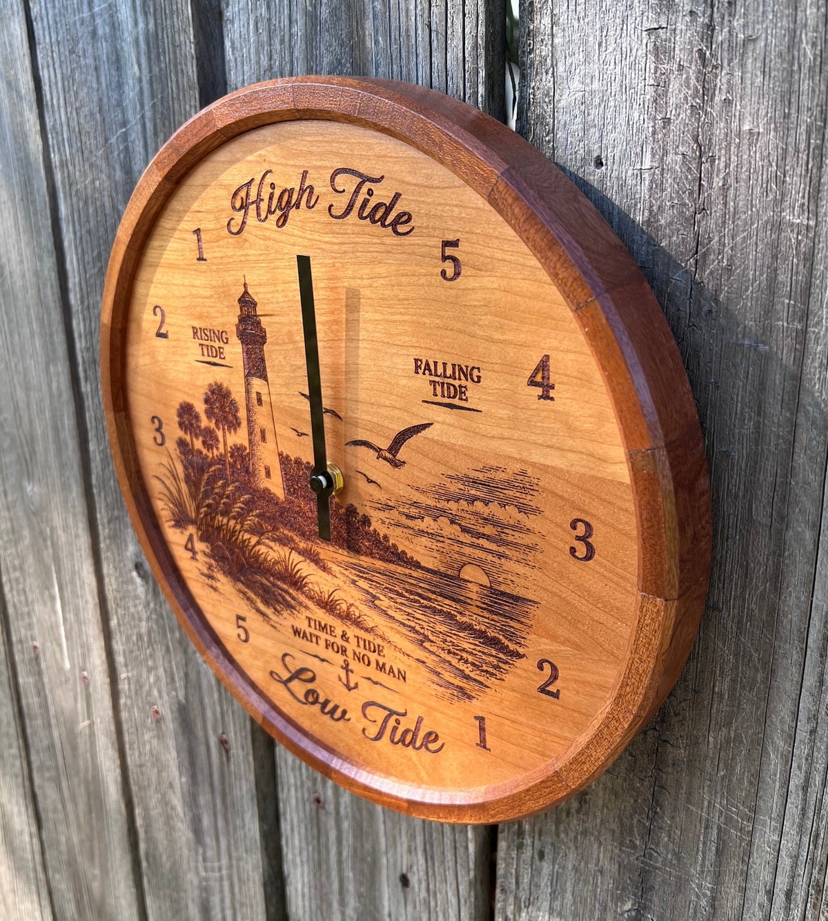Angled view of the original lighthouse tide clock showing the segmented sapele ring