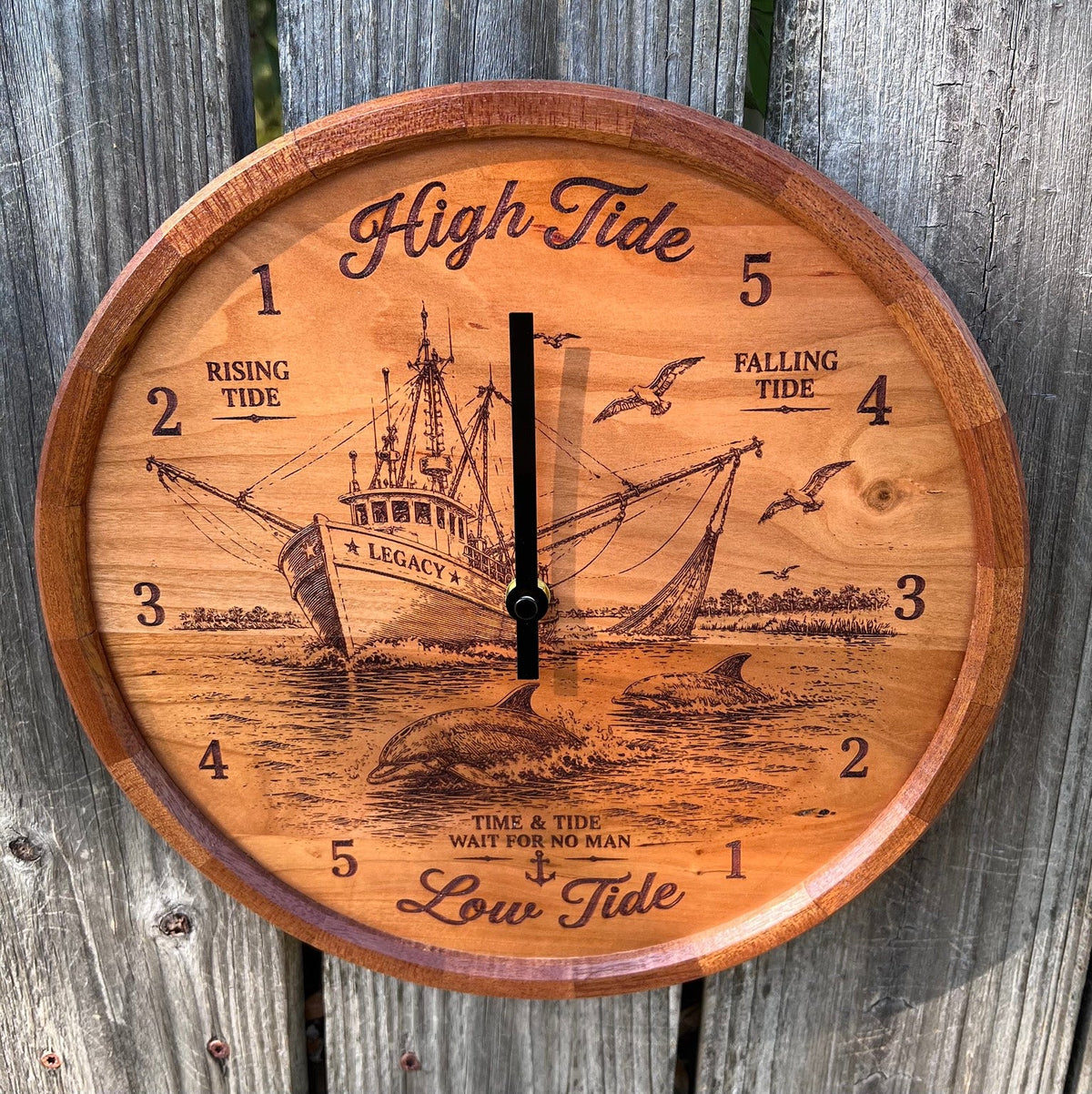Front view of the shrimp boat tide clock with segmented sapele ring